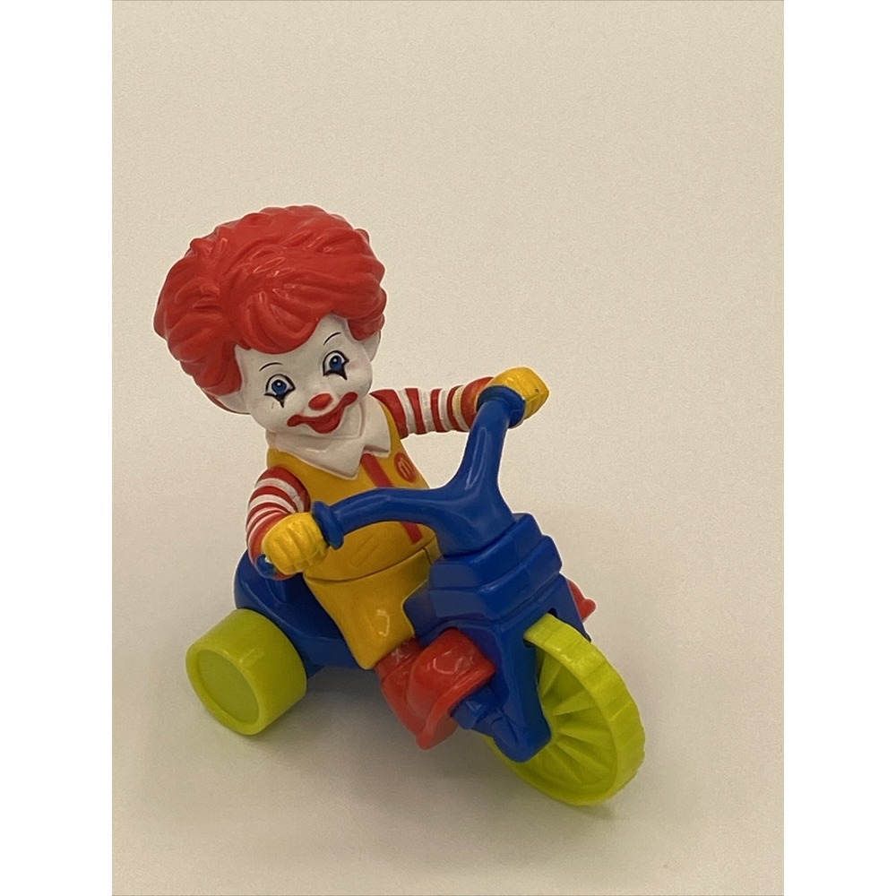 VTG McDonald's - Baby Ronald McDonald on Big Wheel - Fisher Price Happy Meal Toy